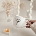 Kubek 300 ml - Kocham Cię Dziadku + Imię ZŁOTE SERCE Zbliżenie na złote zdobienie serca na białym kubku porcelanowym Kocham Cię Dziadku + Imię nadzwyczajnie.mom
