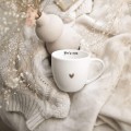 Biały kubek porcelanowy 300 ml - napis you're mine ze złotym sercem dla ukochanej osoby na walentynki Personalizowany kubek porcelanowy ze złotym sercem jako idealny prezent — porcelana premium nadzwyczajnie.mom